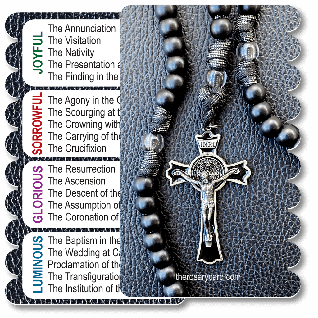 The Rosary Experience series honors the many types of Rosaries we use in our devotions. This card features a black bead paracord Rosary with the St. Benedict crucifix on the front, and a full listing of the Joyful, Sorrowful, Glorious, and Luminous Mysteries on the back.